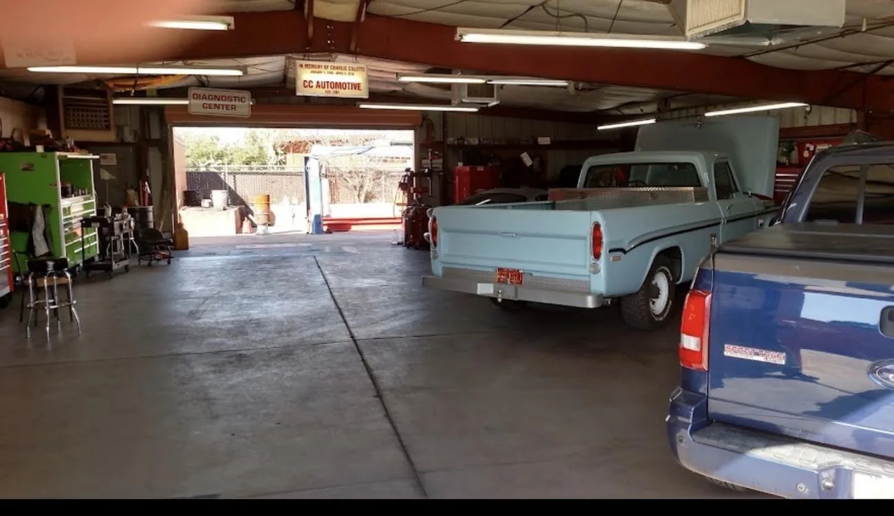 Inside the C.C. Automotive diagnostic center with a classic truck