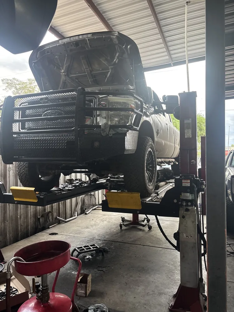Lifted truck on the alignment rack